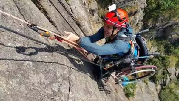 Courage or Foolish Risk? Meet the Paralyzed Man Who Climbed 500-Meter High Mountain in His Wheelchair (Photos)